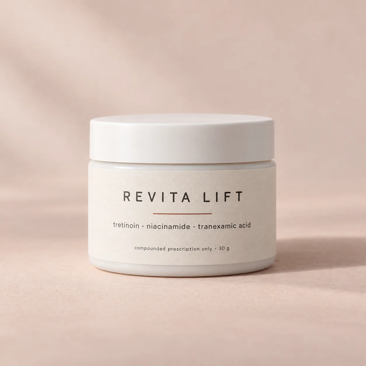 A jar of compounded tretinoin and niacinamide night cream